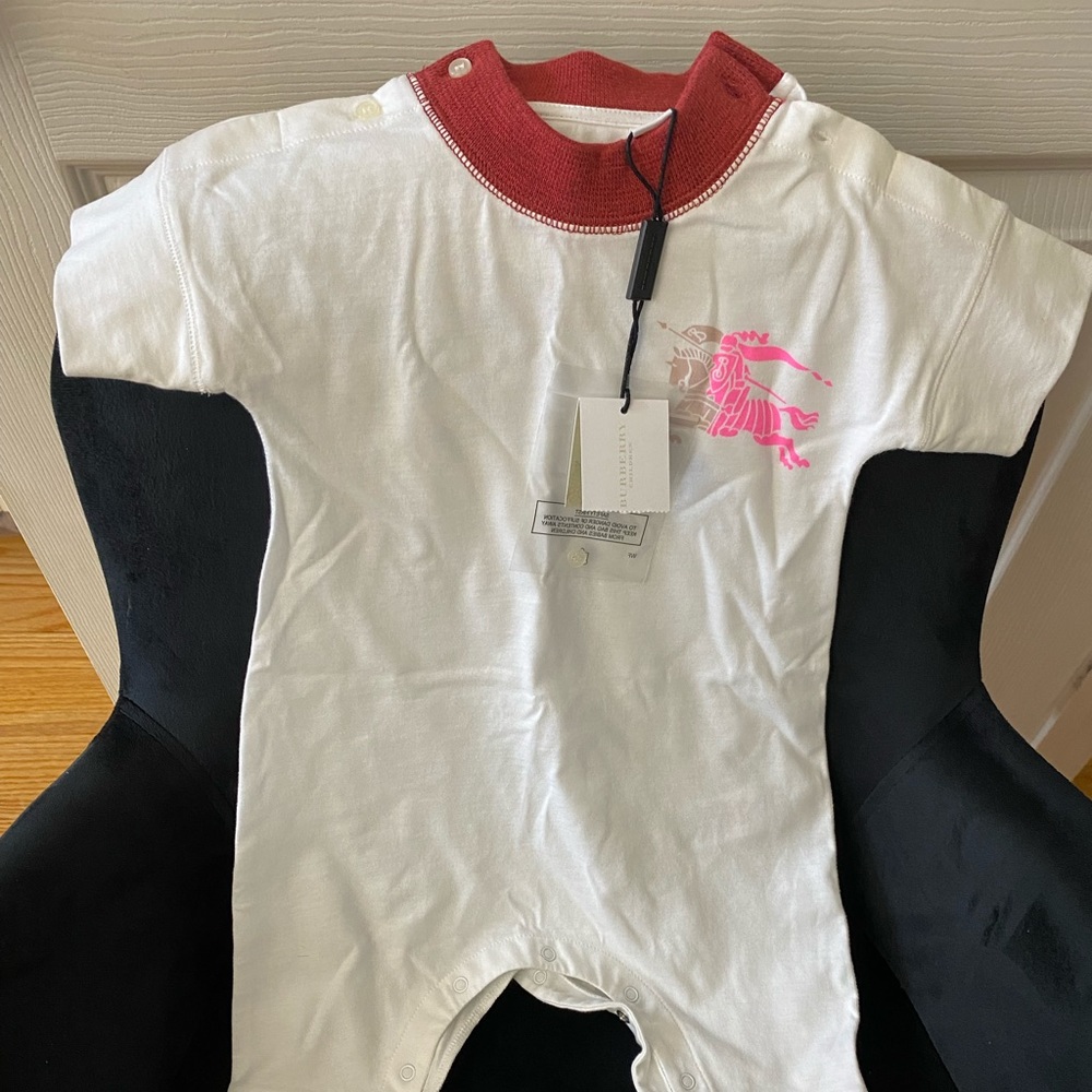 Burberry Randall bodysuit. Never been worn with tags attached.